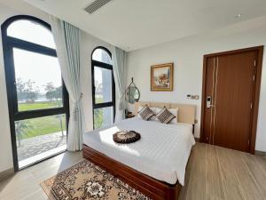 Postel nebo postele na pokoji v ubytování Thành Công Hotel + 37 fotografií