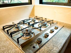 a stove top oven with four burners on it at GOYADO in Ozu