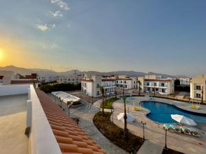 an image of a swimming pool on a building at Blue Residence Dahab in Dahab