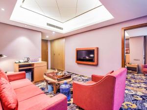 Χώρος καθιστικού στο Guangzhou Huihe Hotel