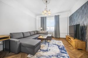 Posezení v ubytování Cozy apartment in the city center
