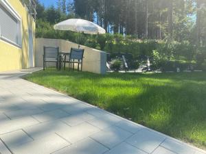 Vonkajšia záhrada v ubytovaní Residence JORADO