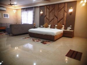 Krevet ili kreveti u jedinici u objektu Riddhi Siddhi Resorts