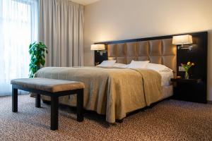 Postel nebo postele na pokoji v ubytování Hotel Avance