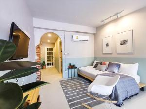 TV a/nebo společenská místnost v ubytování Snoozy Guesthouse
