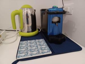 a counter with a coffee maker and a blender at due stanzulelle sul mare B&B in Salerno