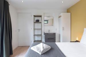 Krevet ili kreveti u jedinici u okviru objekta Amsterdam Dunes Holiday Home