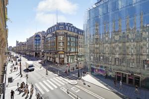una rappresentazione di una strada urbana con edifici di TheLander - Serviced Apartments in Louvre - Rivoli a Parigi