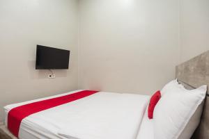 Voodi või voodid majutusasutuse RedDoorz Plus at Eskole ITERA Lampung toas