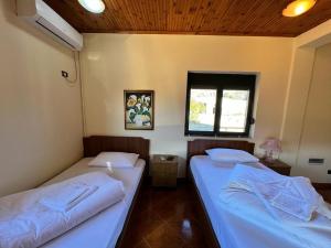 Postel nebo postele na pokoji v ubytování HOTEL FLAVIA