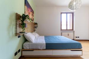 Posteľ alebo postele v izbe v ubytovaní Residenza al Corso