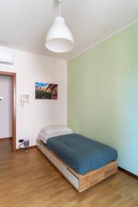 Posteľ alebo postele v izbe v ubytovaní Residenza al Corso