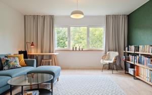 Posezení v ubytování Cozy apartment in Suuremõisa