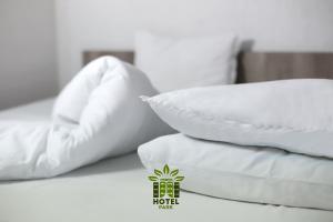 Postel nebo postele na pokoji v ubytování Hotel Park
