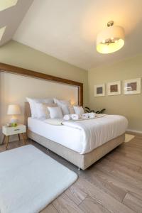 Posteľ alebo postele v izbe v ubytovaní Apartament 24 AbsyntApart Rynek Wrocław
