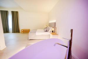 Letto o letti in una camera di Regiohotel Manfredi