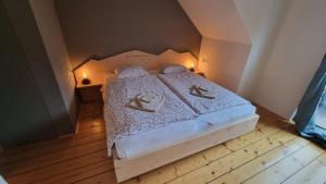 Postel nebo postele na pokoji v ubytování Vila Koman Jezersko