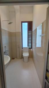 Koupelna v ubytování Happy Life Mount View + 22 fotografií