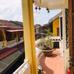 a view from the balcony of a house at Pho Hoi 1 Hotel in Hoi An