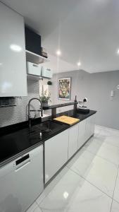 A kitchen or kitchenette at Infinity View ( Arenales del Sol )