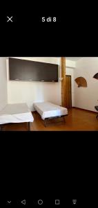Postel nebo postele na pokoji v ubytování Residence Baia Blu Falcone