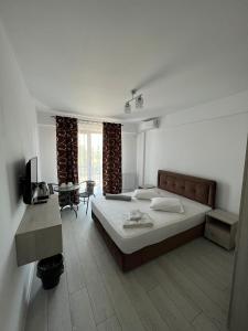 Postel nebo postele na pokoji v ubytování Luxury by SARAY