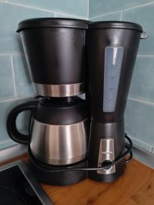 Coffee and tea making facilities at Aqua Apt Sunrise & Sea Views
