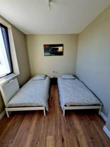 Posteľ alebo postele v izbe v ubytovaní Appartement 2 chambres