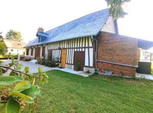 Κήπος έξω από το Maison Normande proche mer