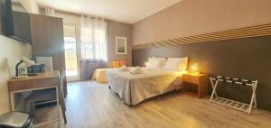 Postel nebo postele na pokoji v ubytování Bed & Bike Feltre