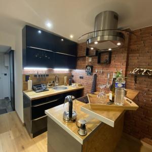 Virtuvė arba virtuvėlė apgyvendinimo įstaigoje Escale Studio Gonesse