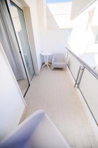 Letto o letti in una camera di Regiohotel Manfredi