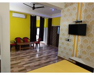 Телевизия и/или развлекателен център в Hotel The Raja Bhoj Palace, Bhopal