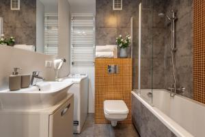 Kúpeľňa v ubytovaní Apartament 24 AbsyntApart Rynek Wrocław