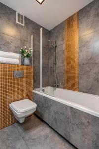 Kúpeľňa v ubytovaní Apartament 24 AbsyntApart Rynek Wrocław