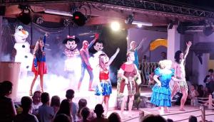 a group of performers on a stage in front of a crowd at Agde MOBIL HOME 3CH-SECTEUR VIP GARDEN VILLAGE CLUB PARC ACQUATIQUE in Le Grau-dʼAgde +27 photos