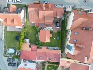 an overhead view of a house with red roofs at Agamim Apartments in Mikołajki