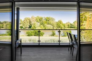 Balkón nebo terasa v ubytování Wohnambiente am See