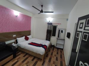 Ліжко або ліжка в номері Hotel Kajiinn