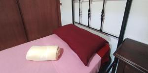 A bed or beds in a room at Casa di Vacanza Marina di Davoli