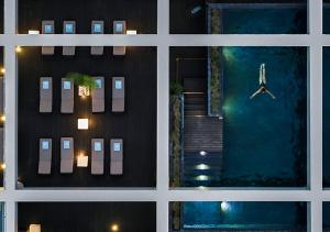 an aerial view of a building with a pool at Octant Ponta Delgada in Ponta Delgada