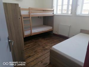 Cama o camas de una habitación en Gite d'Etape de Chirac