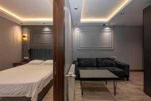 Postel nebo postele na pokoji v ubytování Comfort Suites Hotel