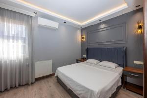 Postel nebo postele na pokoji v ubytování Comfort Suites Hotel