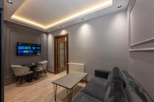 Posezení v ubytování Comfort Suites Hotel