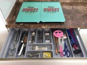 a drawer filled with utensils on a counter at Mojácar Vibes 1 Línea de Playa in Mojácar