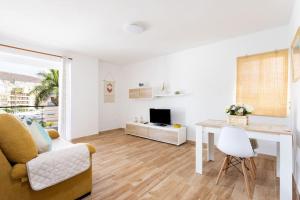 TV a/nebo společenská místnost v ubytování Vivienda Vacacional Rosaini