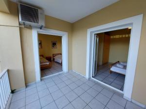 Μια τηλεόραση ή/και κέντρο ψυχαγωγίας στο Kidonakia Apartments