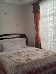 Postel nebo postele na pokoji v ubytování Lux suites Utawala Family House