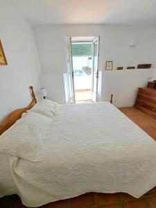 Postel nebo postele na pokoji v ubytování CASA SINCLAIR